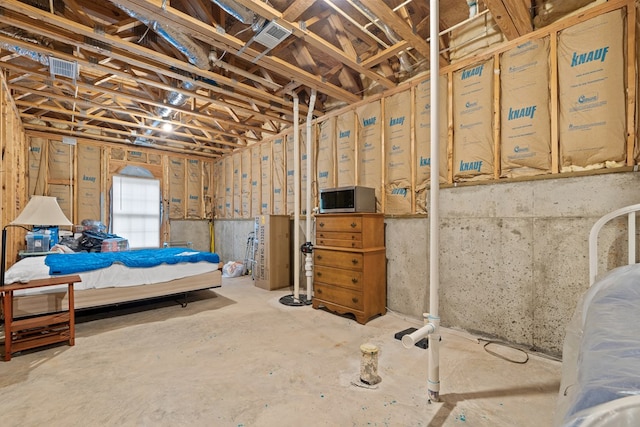 411 Rockville Rd, Eatonton, GA 31024 - bedroom featuring concrete floors