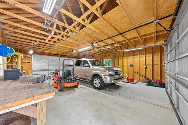 411 Rockville Rd, Eatonton, GA 31024 - garage featuring a garage door opener