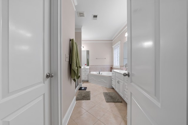 411 Rockville Rd, Eatonton, GA 31024 - bathroom with tile patterned floors, ornamental molding, a garden tub, and vanity
