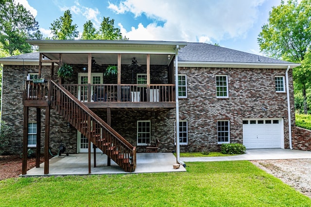 411 Rockville Rd, Eatonton, GA 31024 - back of house featuring a patio, ceiling fan, a lawn, driveway, and brick siding