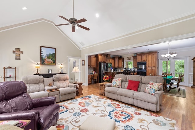 411 Rockville Rd, Eatonton, GA 31024 - living area featuring a chandelier, a ceiling fan, light wood-type flooring, high vaulted ceiling, and recessed lighting