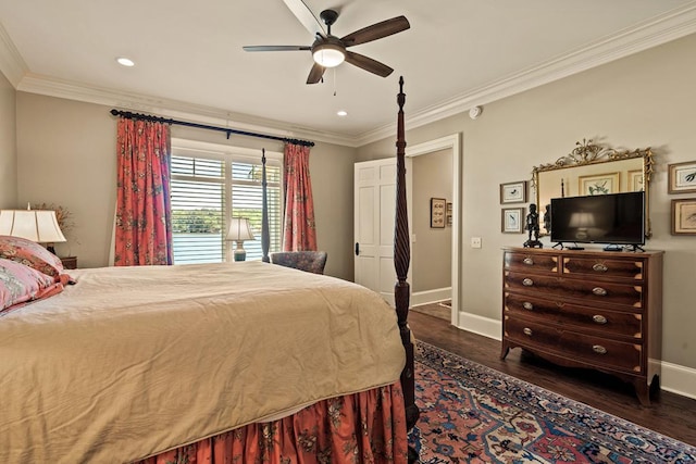 bedroom with ceiling fan, dark hardwood / wood-style floors, and crown molding