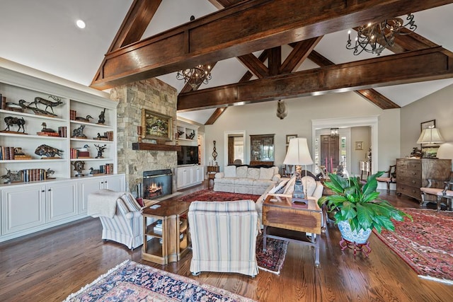 living room featuring beam ceiling, a stone fireplace, a chandelier, and dark hardwood / wood-style floors