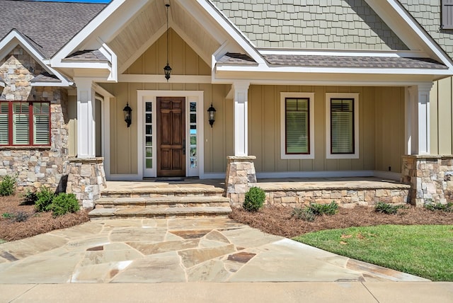 entrance to property featuring covered porch