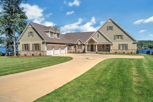 craftsman-style home with a front yard and a garage