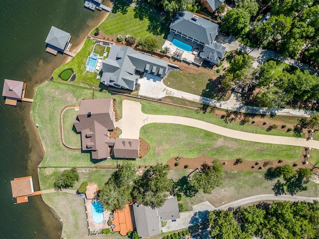 bird's eye view with a water view