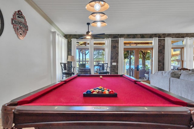 recreation room featuring ceiling fan, french doors, ornamental molding, and billiards