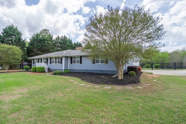 220 Pitts Chapel Rd, Newborn, GA 30056 - view of front of property featuring a porch, a chimney, fence, crawl space, and a front yard