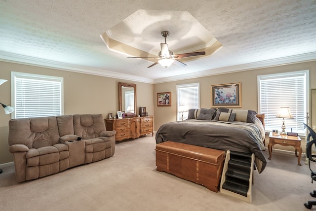 220 Pitts Chapel Rd, Newborn, GA 30056 - carpeted bedroom featuring a raised ceiling, a textured ceiling, crown molding, and ceiling fan