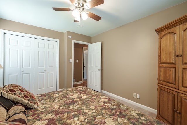 220 Pitts Chapel Rd, Newborn, GA 30056 - bedroom featuring baseboards, a ceiling fan, carpet floors, and a closet