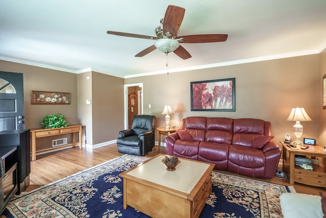 220 Pitts Chapel Rd, Newborn, GA 30056 - living room featuring baseboards, wood finished floors, ceiling fan, and crown molding