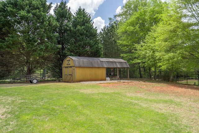 220 Pitts Chapel Rd, Newborn, GA 30056 - view of yard featuring fence, an outbuilding, and a storage shed