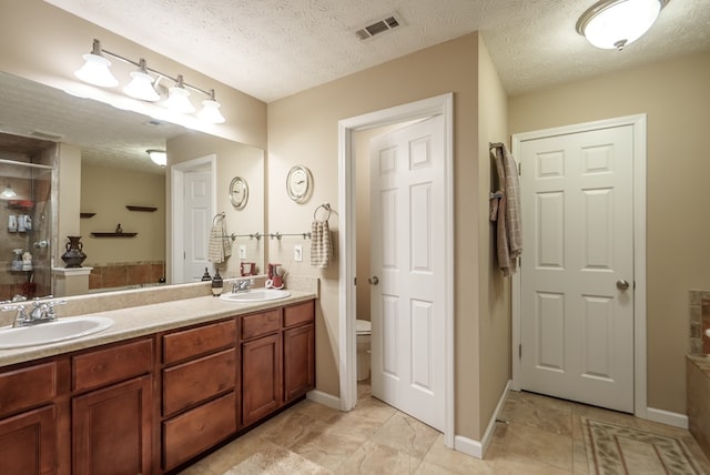 220 Pitts Chapel Rd, Newborn, GA 30056 - full bathroom with tile patterned flooring, a sink, visible vents, and double vanity