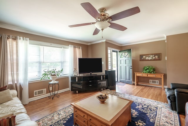 220 Pitts Chapel Rd, Newborn, GA 30056 - living room with a ceiling fan, ornamental molding, wood finished floors, and visible vents