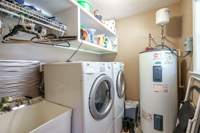 220 Pitts Chapel Rd, Newborn, GA 30056 - clothes washing area with independent washer and dryer, electric water heater, laundry area, and a sink