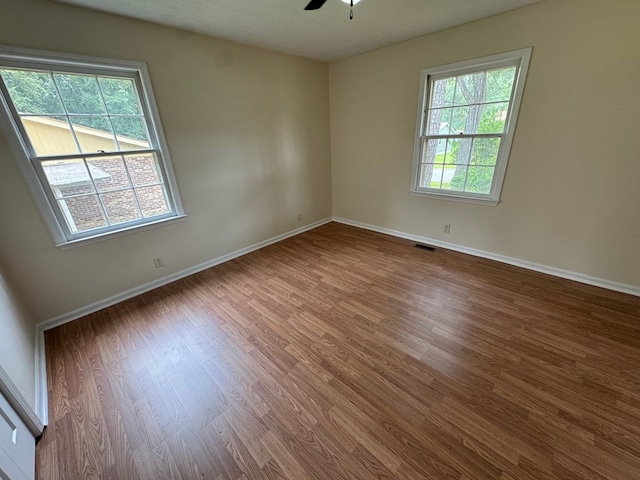 2275 Leo Ct, Milledgeville, GA 31061 - unfurnished room featuring wood finished floors, a ceiling fan, and baseboards