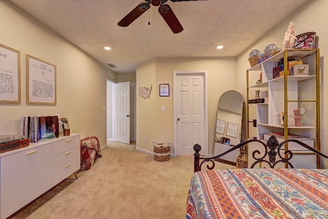 bedroom with visible vents, recessed lighting, baseboards, and light carpet