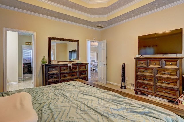 bedroom featuring baseboards and ornamental molding