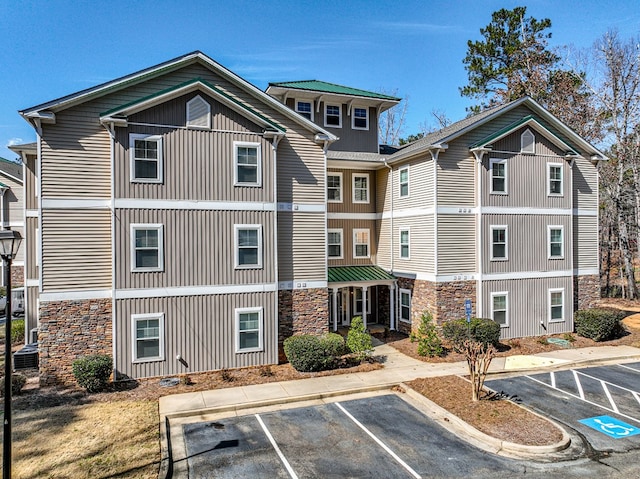 222 Sheffield Dr Unit E-5, Sparta, GA 31087 - view of building exterior with uncovered parking