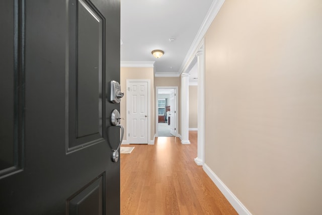 222 Sheffield Dr Unit E-5, Sparta, GA 31087 - hall featuring ornate columns, baseboards, ornamental molding, and light wood-style floors