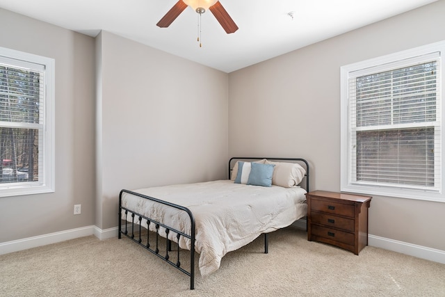 222 Sheffield Dr Unit E-5, Sparta, GA 31087 - carpeted bedroom featuring ceiling fan and baseboards