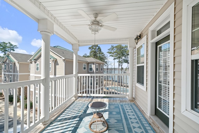 222 Sheffield Dr Unit E-5, Sparta, GA 31087 - balcony with ceiling fan and a water view