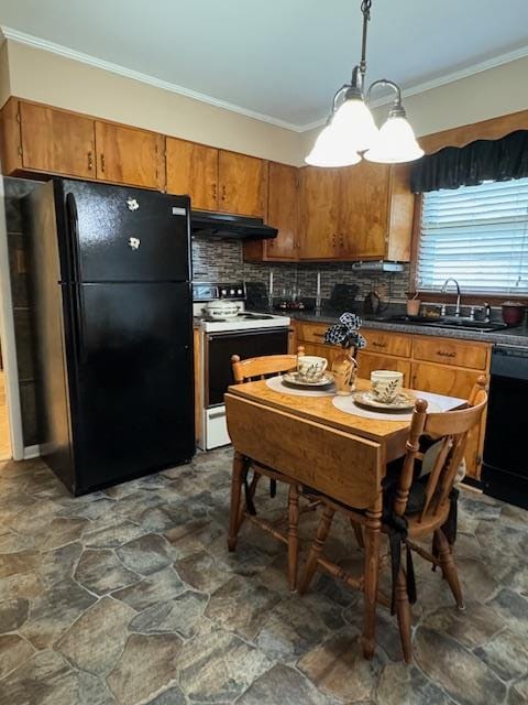 kitchen with sink, crown molding, decorative light fixtures, decorative backsplash, and black appliances