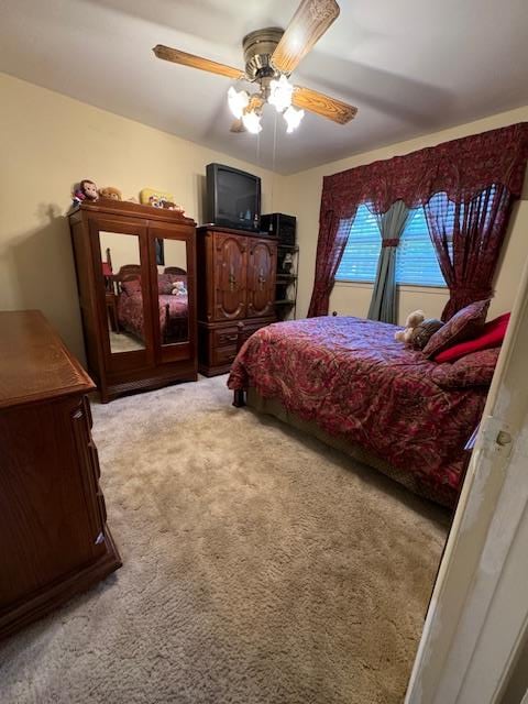 bedroom with carpet flooring and ceiling fan