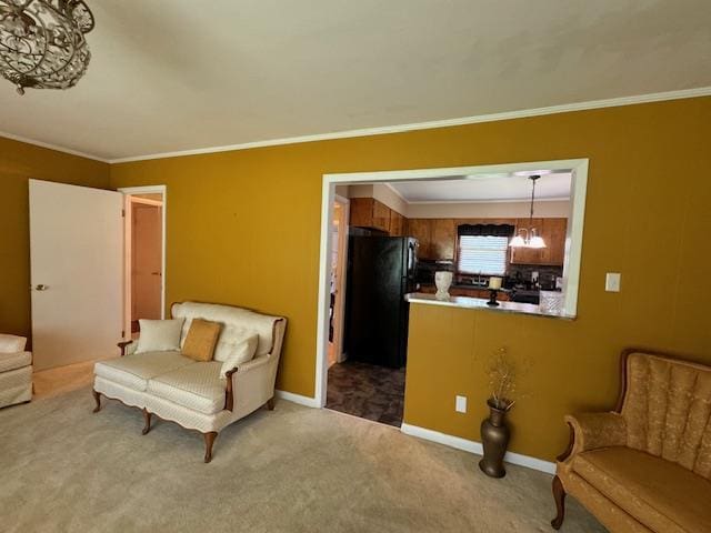 living room featuring carpet and crown molding