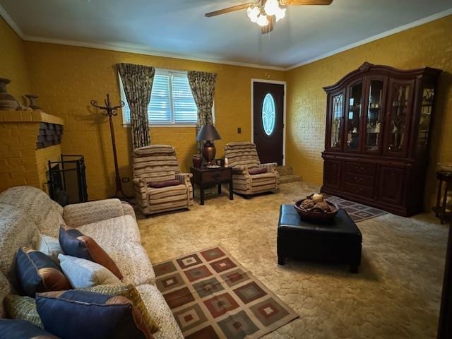 living area with carpet flooring, ceiling fan, and crown molding