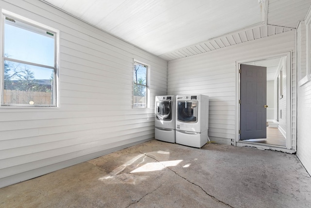 washroom featuring laundry area and washer and clothes dryer