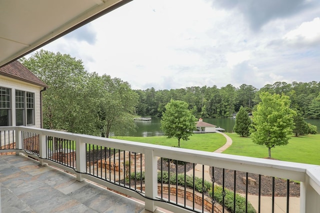 balcony featuring a water view