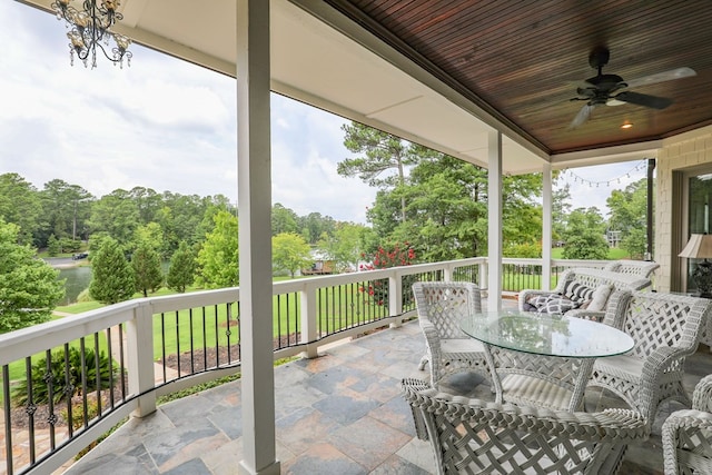 view of patio featuring ceiling fan