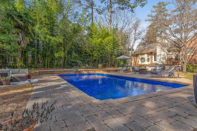 3657 Sussex Dr, Milledgeville, GA 31061 - pool featuring a patio and outdoor lounge area