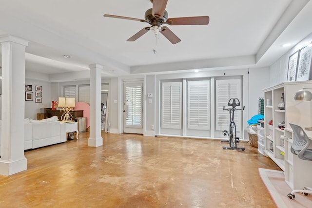 3657 Sussex Dr, Milledgeville, GA 31061 - exercise room featuring radiator heating unit, a ceiling fan, and decorative columns