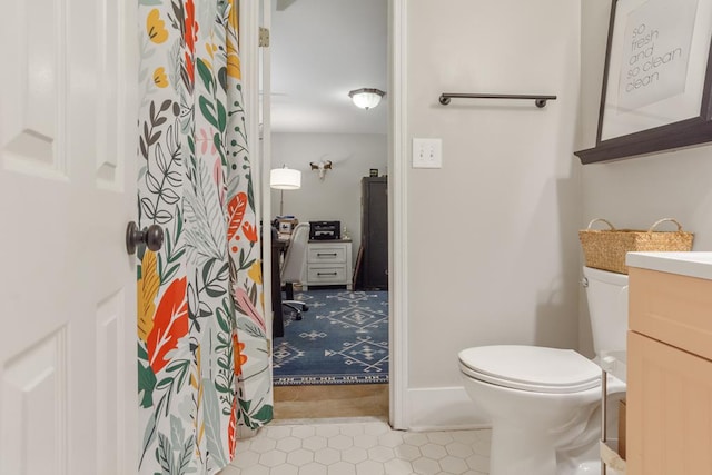 3657 Sussex Dr, Milledgeville, GA 31061 - bathroom featuring tile patterned flooring, toilet, and vanity