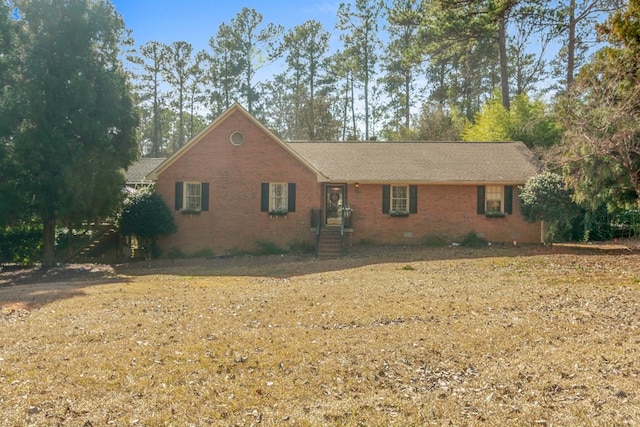 3657 Sussex Dr, Milledgeville, GA 31061 - view of front of house with crawl space and brick siding