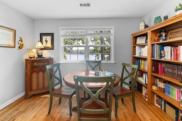 dining space featuring light hardwood / wood-style flooring