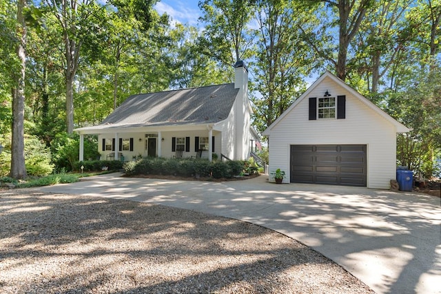 view of front facade featuring a garage and covered porch