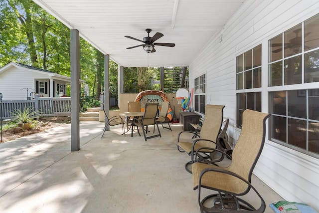 view of patio featuring ceiling fan