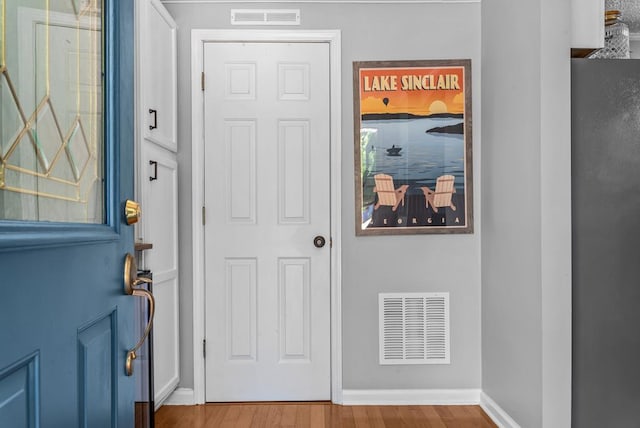 126A N Little River Run, Eatonton, GA 31024 - foyer entrance featuring wood finished floors