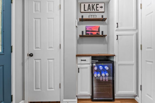 126A N Little River Run, Eatonton, GA 31024 - indoor dry bar with beverage cooler and baseboards