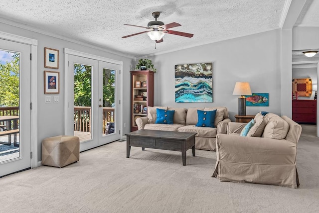 126A N Little River Run, Eatonton, GA 31024 - living room with french doors, carpet flooring, ornamental molding, ceiling fan, and a textured ceiling