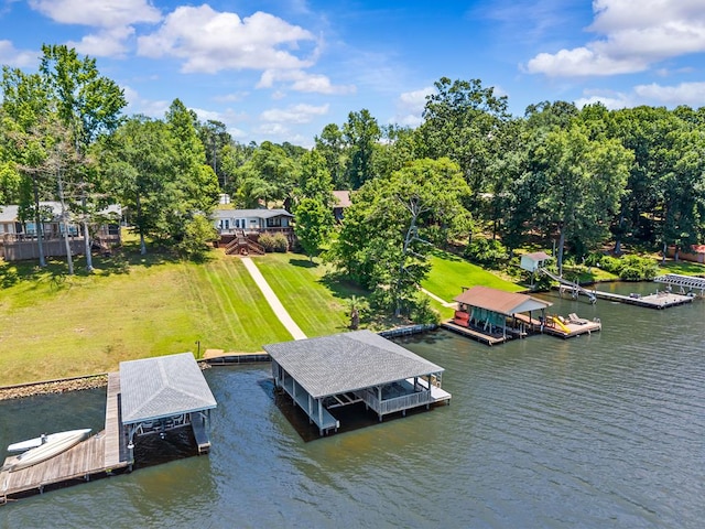 126A N Little River Run, Eatonton, GA 31024 - dock featuring boat lift, a water view, view of scattered trees, and a yard