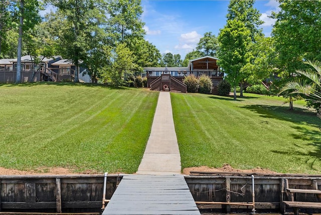 126A N Little River Run, Eatonton, GA 31024 - view of grassy yard with stairway and a boat dock