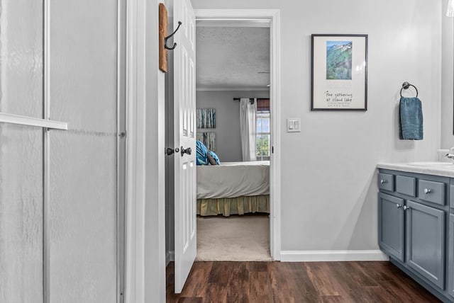 126A N Little River Run, Eatonton, GA 31024 - ensuite bathroom featuring vanity and wood finished floors