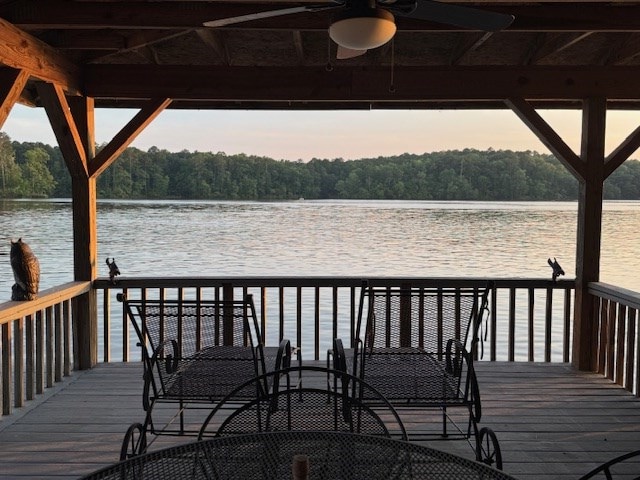 126A N Little River Run, Eatonton, GA 31024 - wooden deck featuring a wooded view, a water view, and ceiling fan