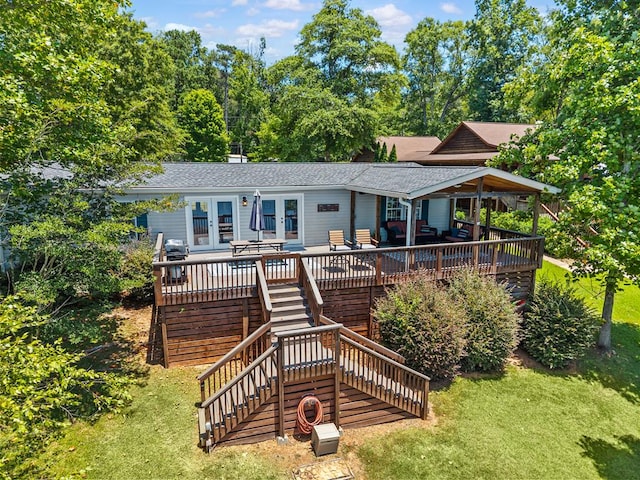 126A N Little River Run, Eatonton, GA 31024 - single story home featuring french doors, stairs, roof with shingles, and a wooden deck