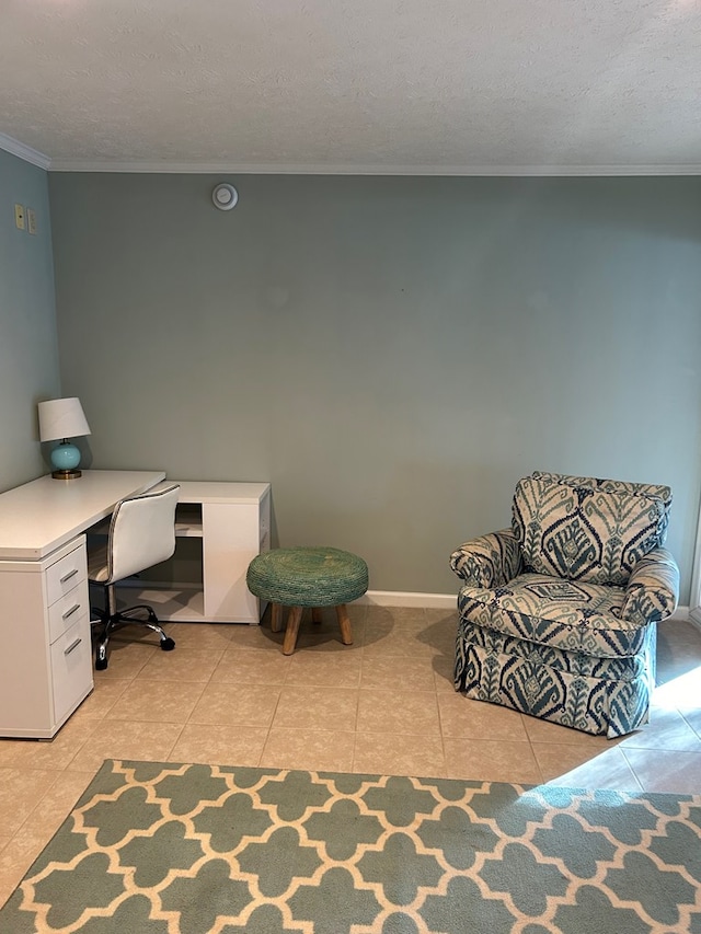 tiled office space featuring crown molding and a textured ceiling