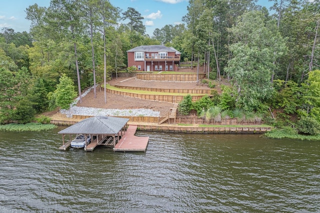 dock area with a water view